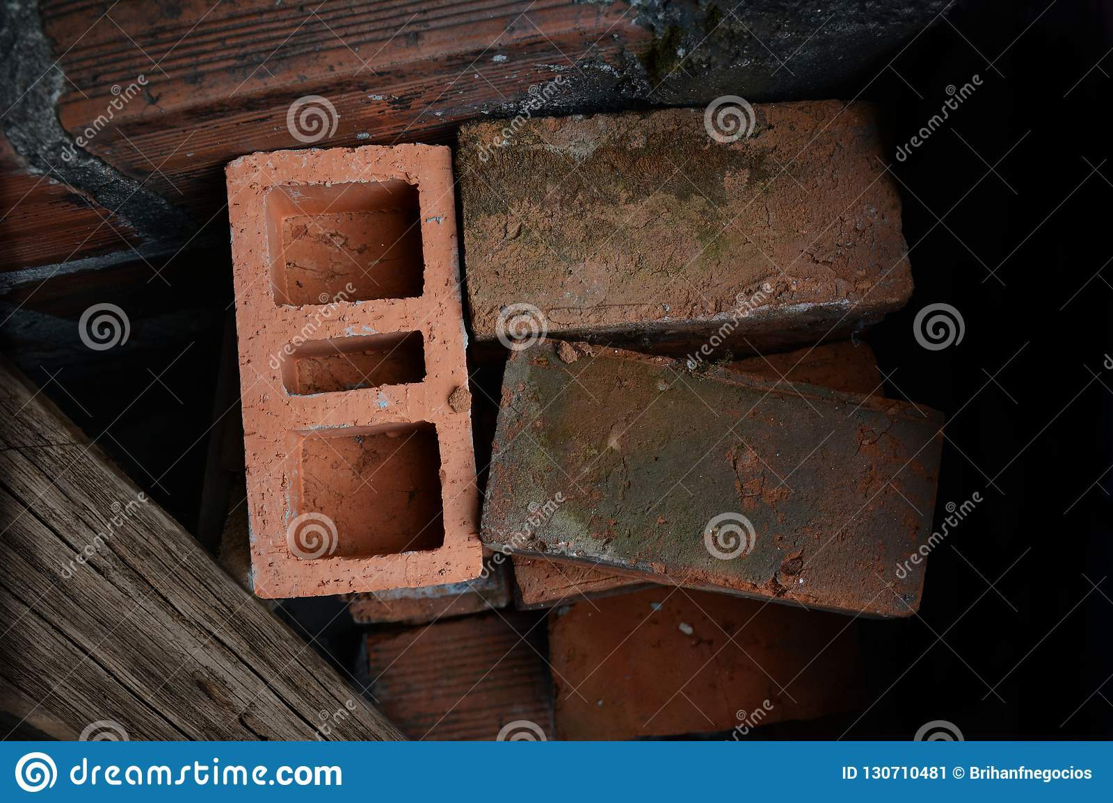 building bricks photograph shows construction elements stack specific orange wooden board